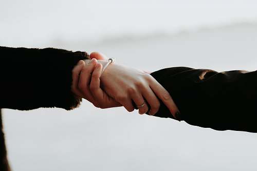 holding hands people holding hands human
